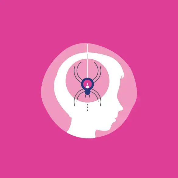 A person's head with a spider on it.