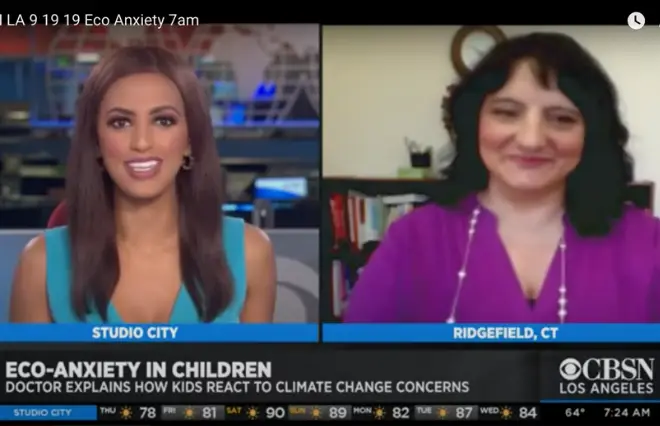 Two women are discussing eczema in children for a media kit.