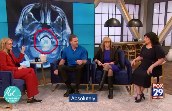 A group of people sitting in chairs on a TV show.