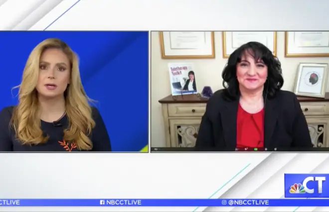 Two women are discussing news topics on a media broadcast.