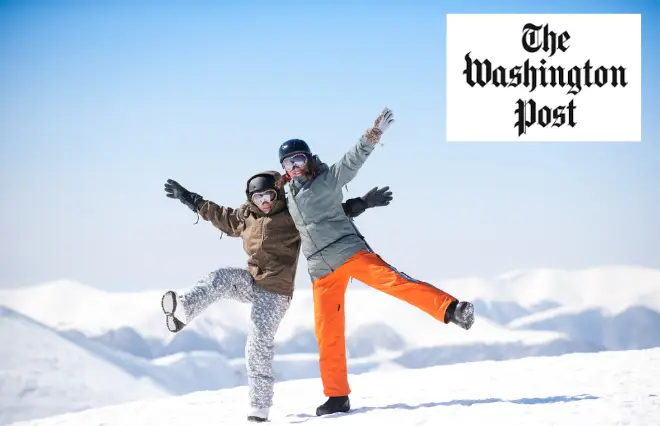 A media kit featuring two people in ski gear standing atop a snowy mountain.