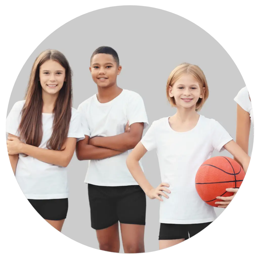 A group of children posing CALMLY with a basketball.